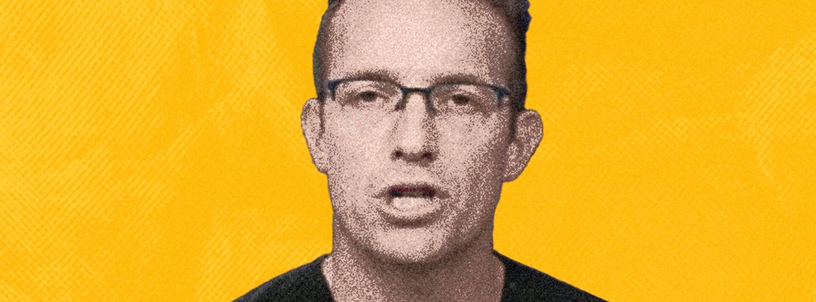 Benny Johnson in front of a yellow background