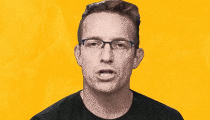 Benny Johnson in front of a yellow background