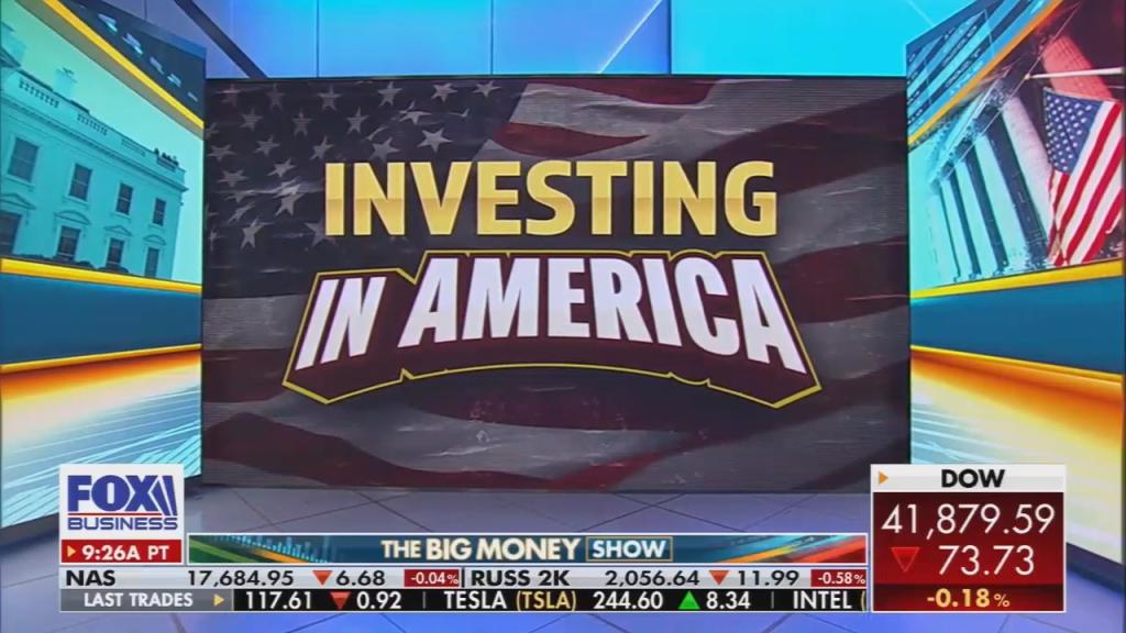 A Fox Business graphic showing an American flag overlaid by "Investing in America"