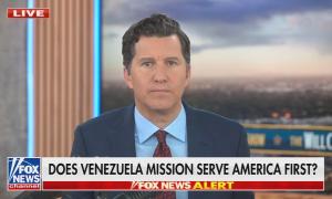 still of Cain; chyron: Does Venezuela mission serve America First?