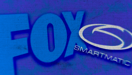 The Fox Corp. logo next to the Smartmatic logo on top of a blue background