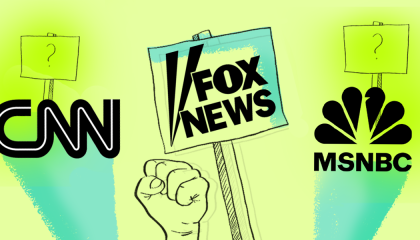 CNN Fox News MSNBC on picket signs 
