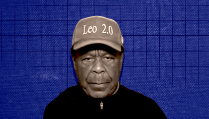Leo Terrell in a Leo 2.0 hat against a purple backdrop