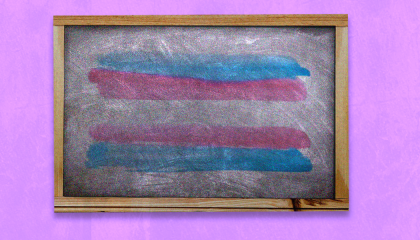 A trans flag on a chalkboard which has a lavender background.